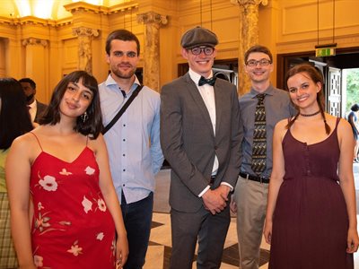 Students at a formal drinks reception in the University Great Hall